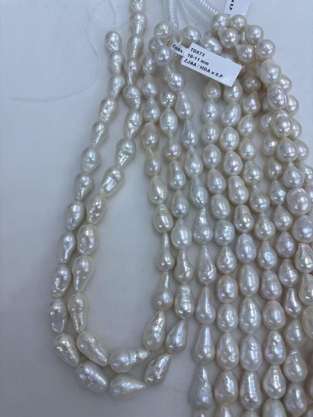 White Teardrop Baroque Freshwater Pearl Strand | 10–11mm AAA Grade