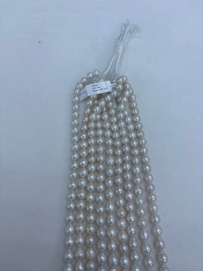 White Freshwater Baroque Teardrop Pearl Strand | 8–10mm AAA Grade