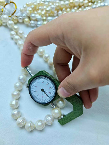 White Saltwater Circled Pearl Strand | 11–15mm AA Grade