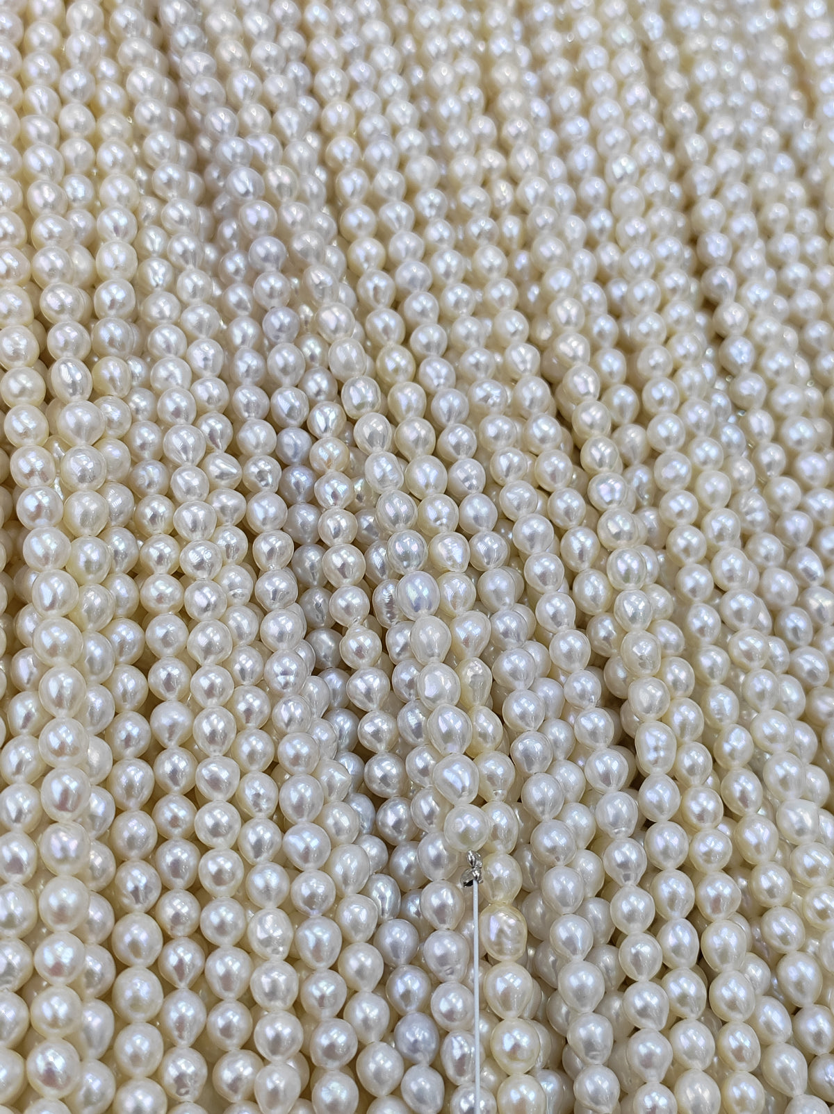 White Freshwater Pearl Strand | 4–4.5mm AA Grade | Drop Rice | Per Strand