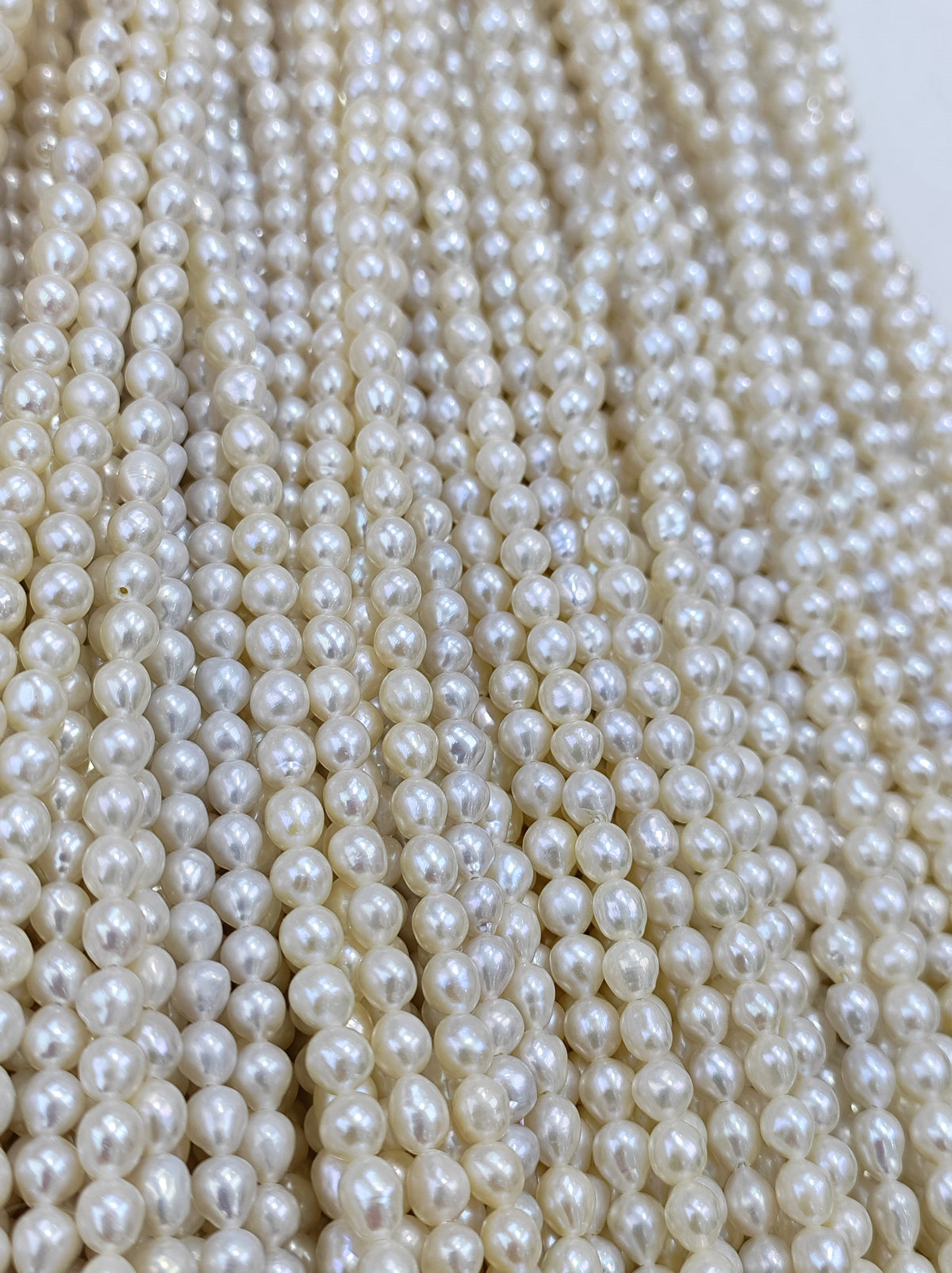 White Freshwater Pearl Strand | 4–4.5mm AA Grade | Drop Rice | Per Strand
