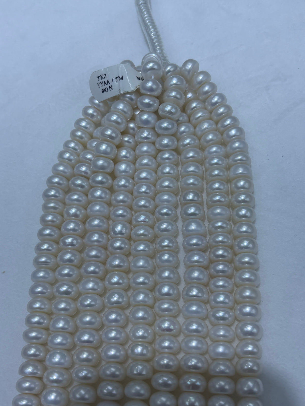 White Bread-Shaped (Button) Freshwater Pearl Strand | 9–10mm AA Grade | Per Strand