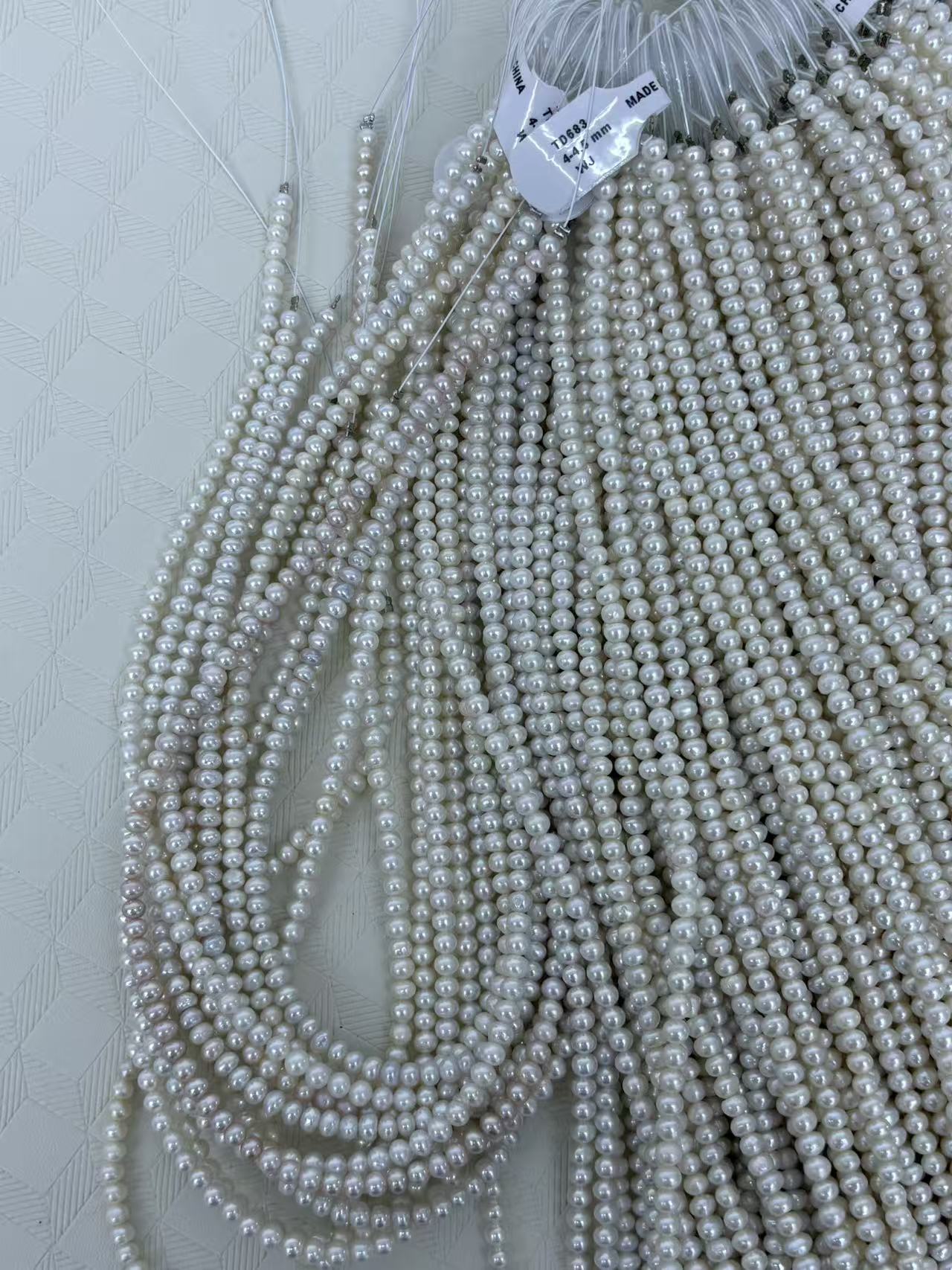 White Oval Freshwater Pearl Strand | 4–4.5mm AAA Grade