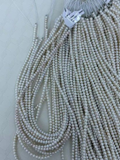 White Oval Freshwater Pearl Strand | 4–4.5mm AAA Grade
