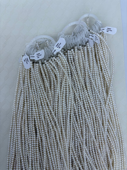 White Oval Freshwater Pearl Strand | 4–4.5mm AAA Grade