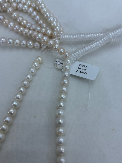 White Freshwater Pearl Strand | 6–8mm AAA Grade