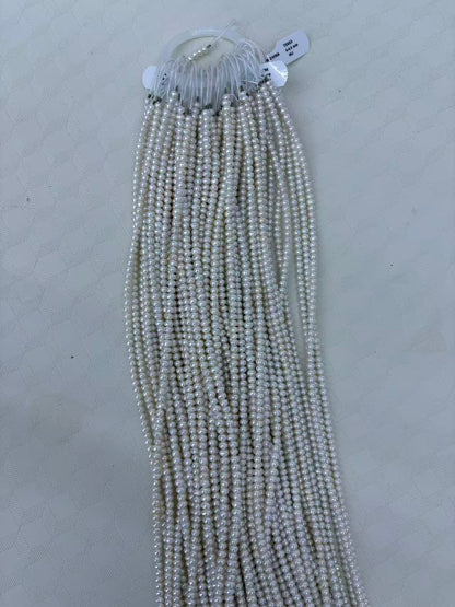 White Oval Freshwater Pearl Strand | 4–4.5mm AAA Grade
