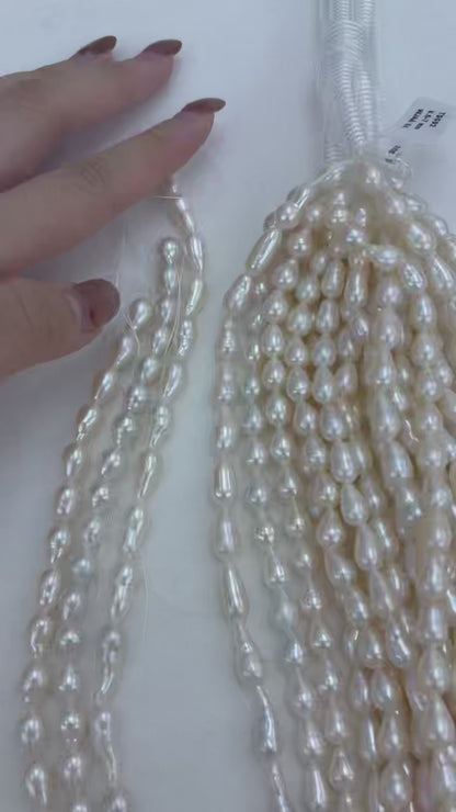 White Teardrop Baroque Freshwater Pearl Strand | 6.5–7mm AAA Grade