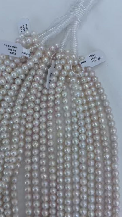 White Freshwater Oval Pearl Strand | 6–8mm AAA Grade