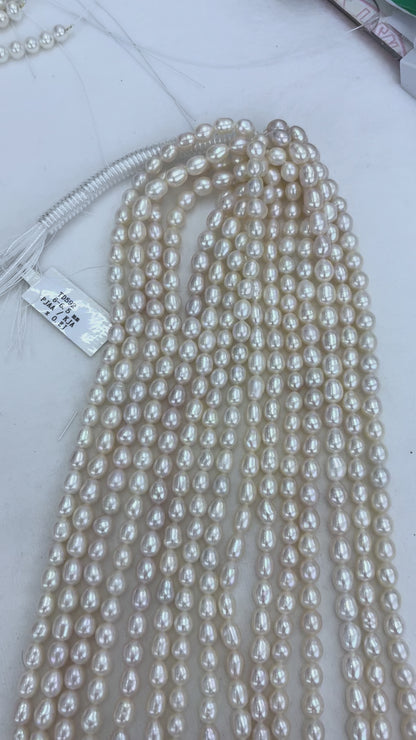 Pinkish-White Freshwater Pearl Strand | 6–6.5mm AAAA Grade